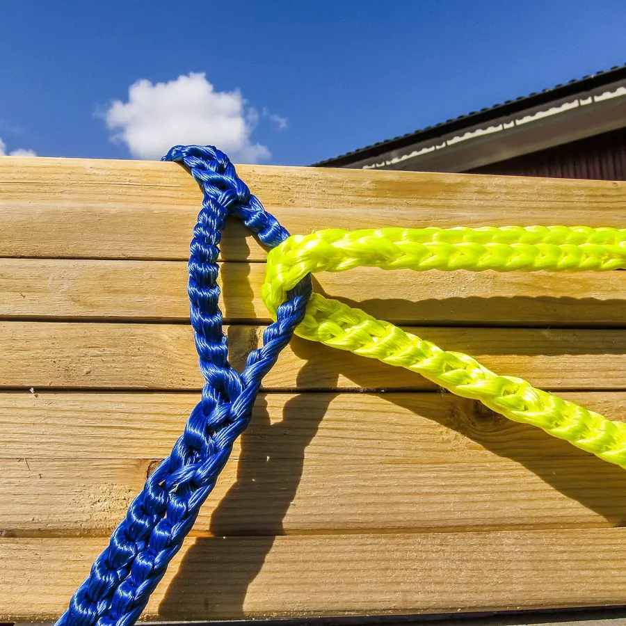Yellow and blue RunLock joined on a timber wall